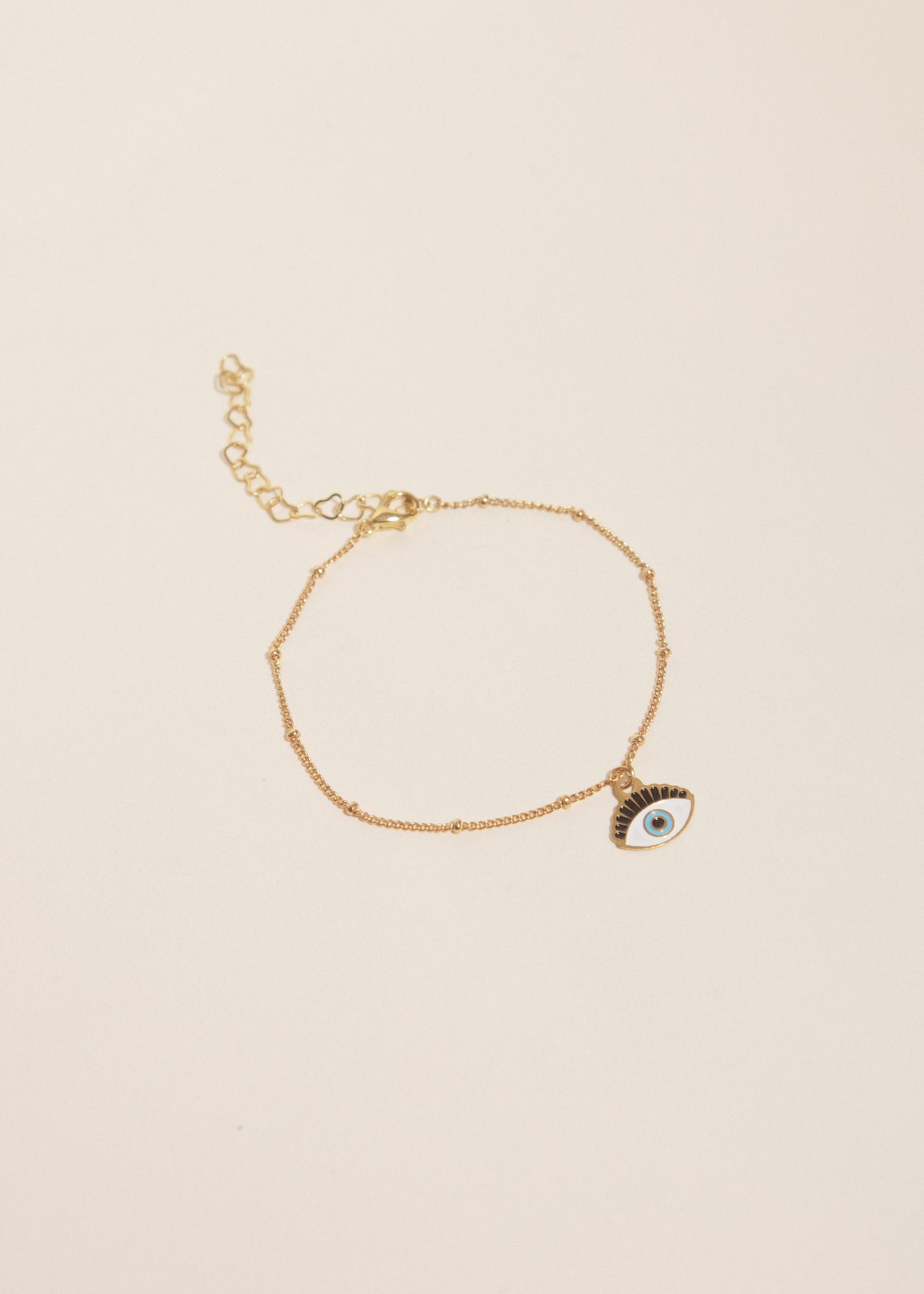 Pulsera dije de ojo con pestañas