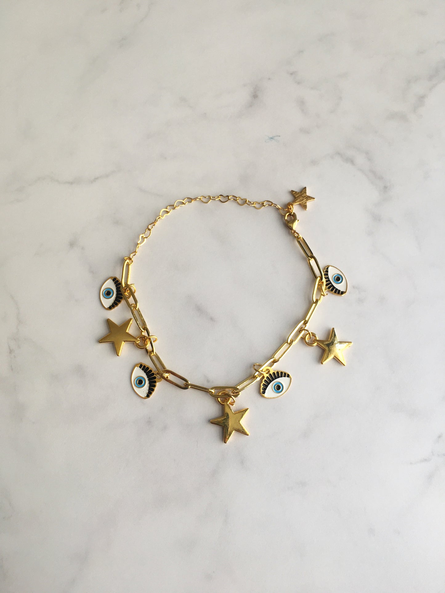 Pulsera estrella y ojo pestaña