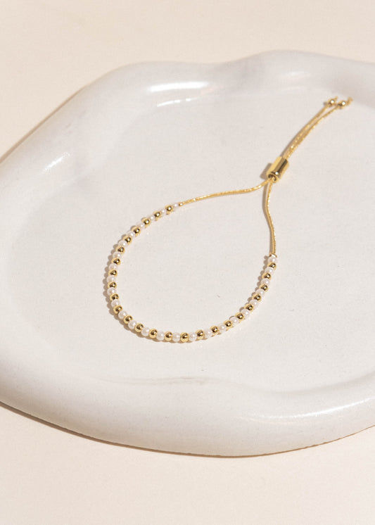 Pulsera perlita dorado