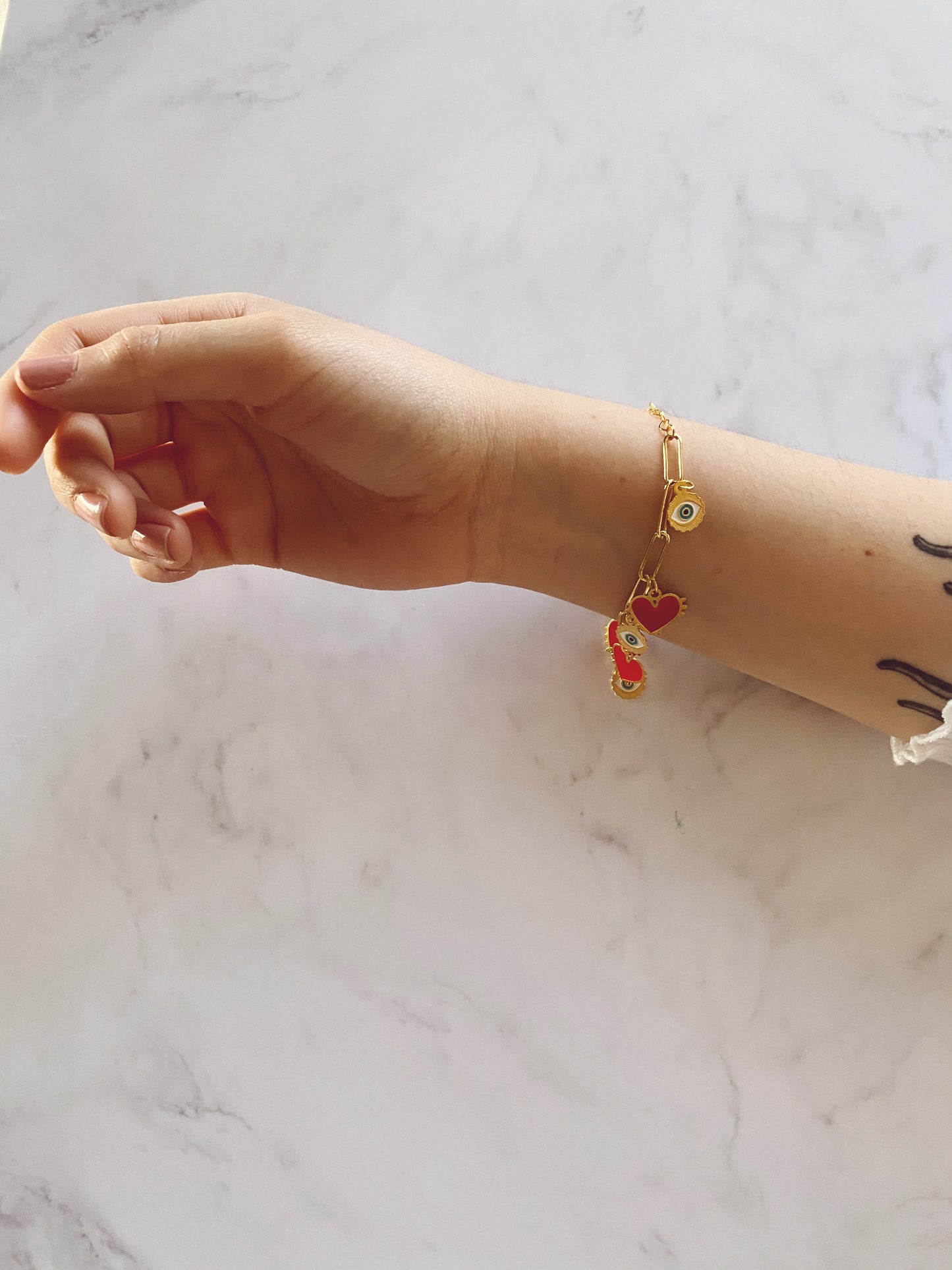 Pulsera corazón y ojo