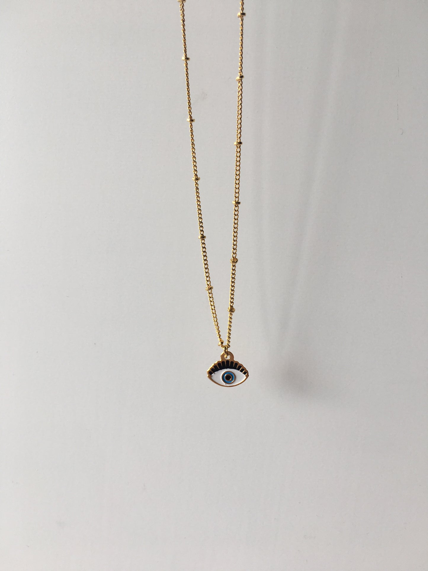 Collar ojo pestaña